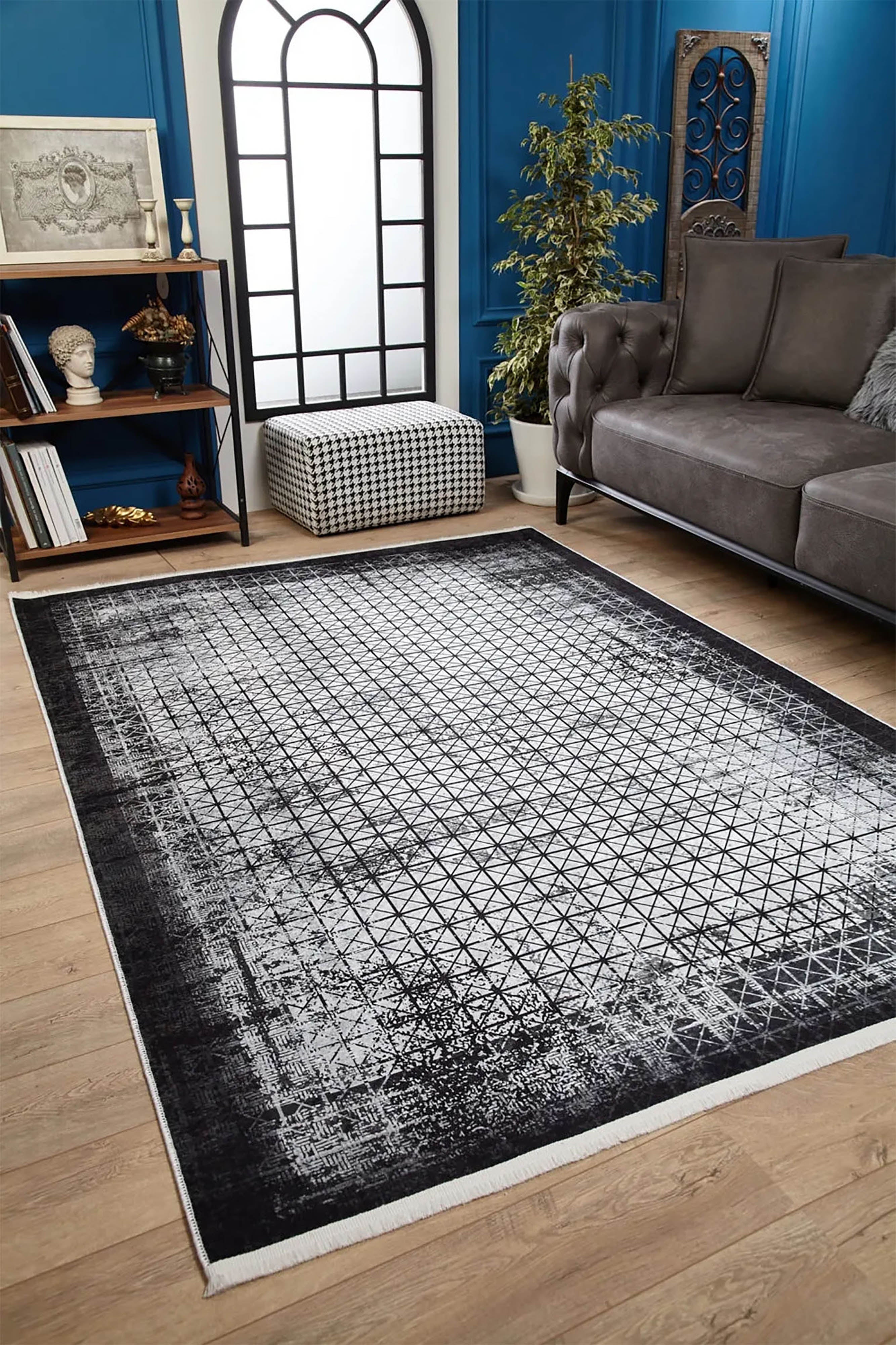 Geometrischer schwarzgrauer Teppich