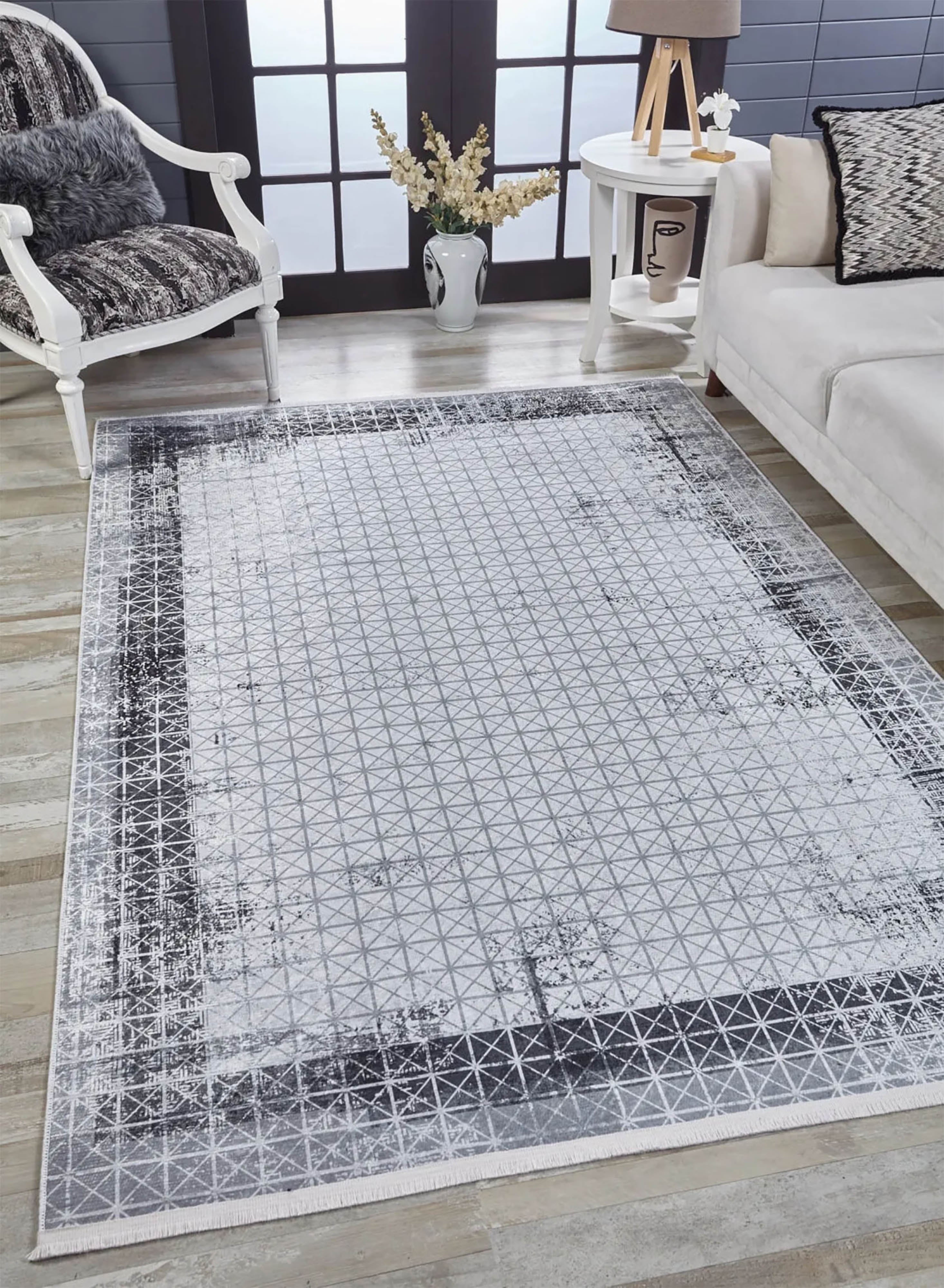 Geometrischer schwarzgrauer Teppich