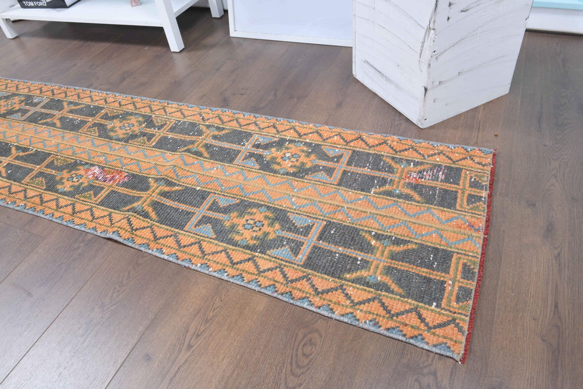 Vintage yolluk 51x296 cm – turuncu, kahverengi ve bej oryantal desenli, el dokuma