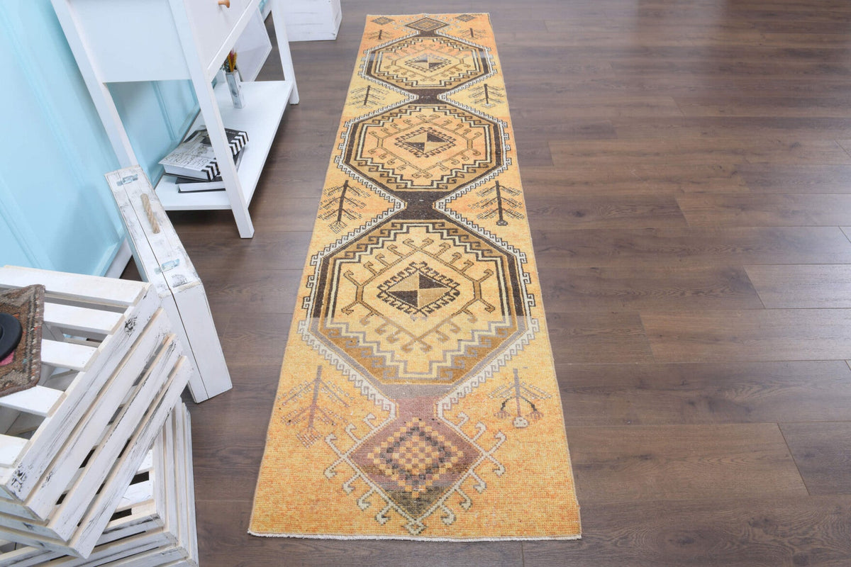 El yapımı vintage yolluk 74x302 cm tribal desenli yün - yakın çekim doku detayı