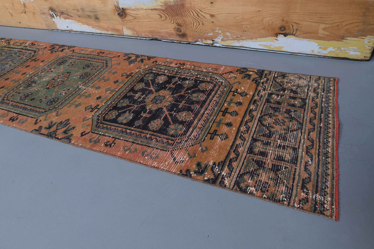 Ikat desenli el dokuma vintage yolluk – mavi, turuncu ve kahverengi tonlarda yün dokuma