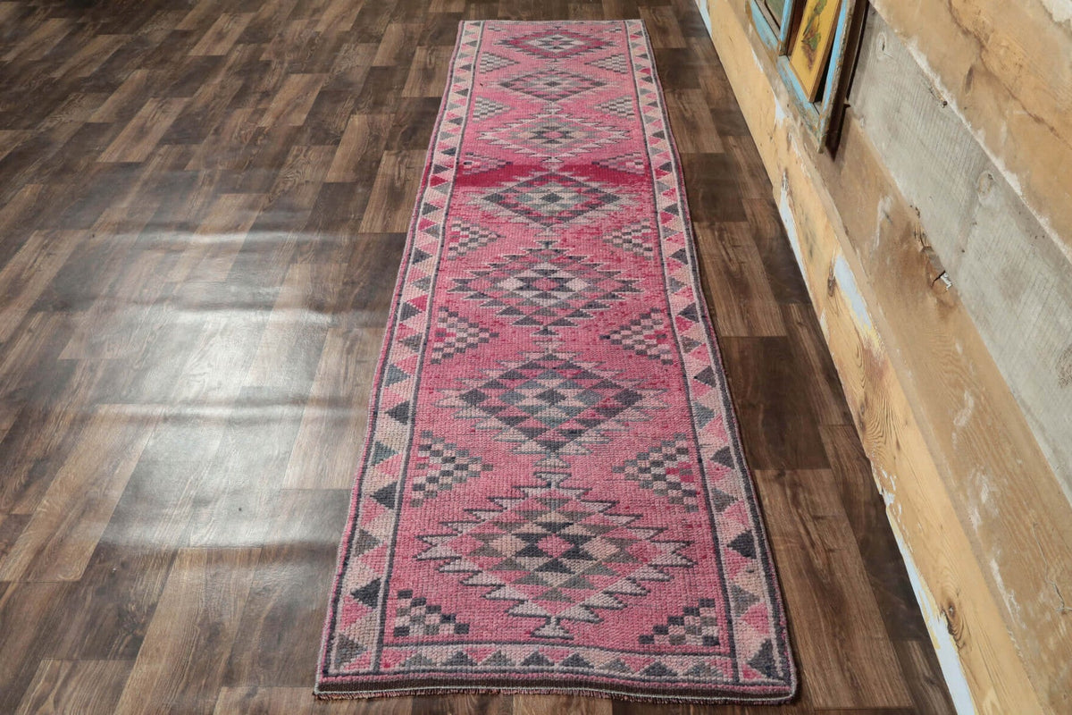 Ikat desenli el dokuma vintage yolluk – kırmızı tonlarda yün dokuma