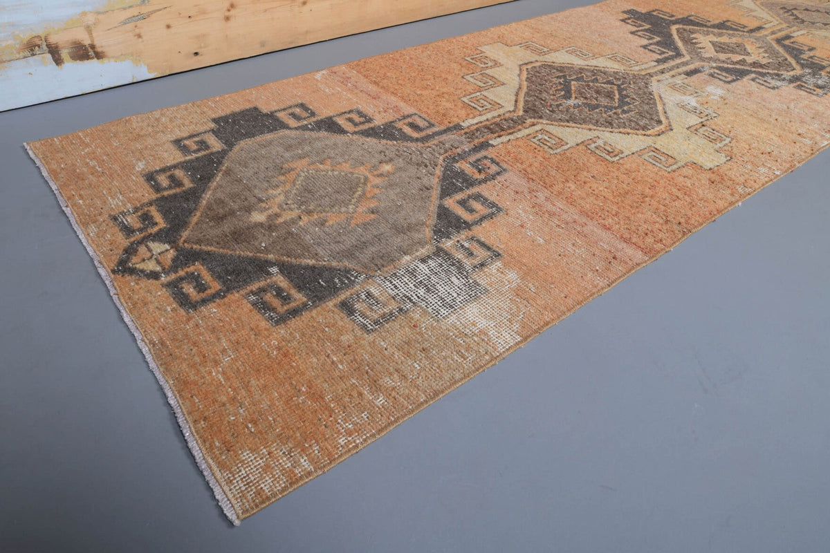 Geometrik desenli el dokuma vintage yolluk – mavi, turuncu ve kahverengi tonlarda yün dokuma
