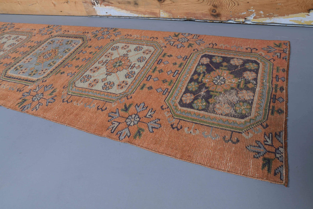 Çiçek desenli el dokuma vintage yolluk – mavi, turuncu ve kahverengi tonlarda yün dokuma