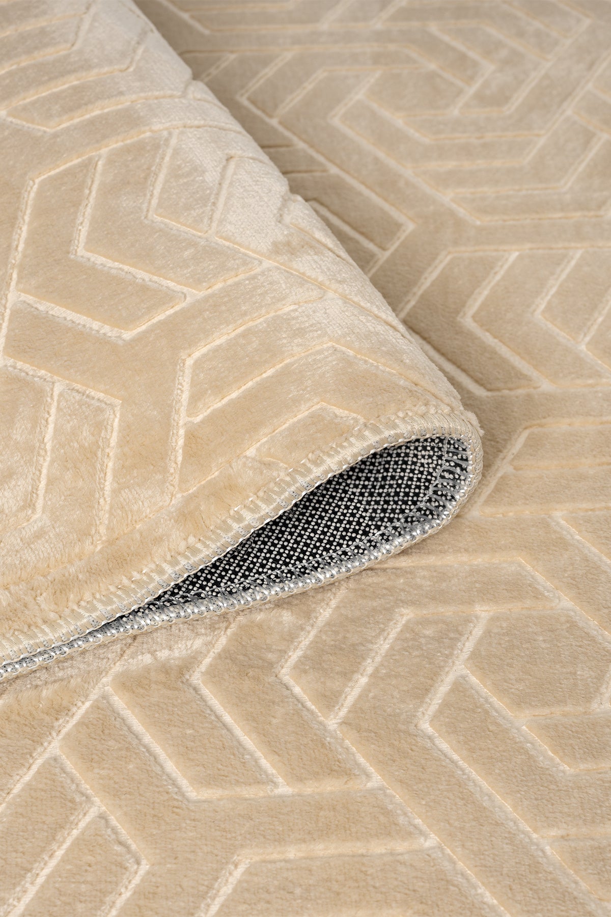 Beigefarbener moderner Teppich mit 3D-Geometriemuster