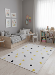Sarı ve Siyah Yıldız Desenli Çocuk Halısı – Yıkanabilir ve Kaymaz Tabanlı