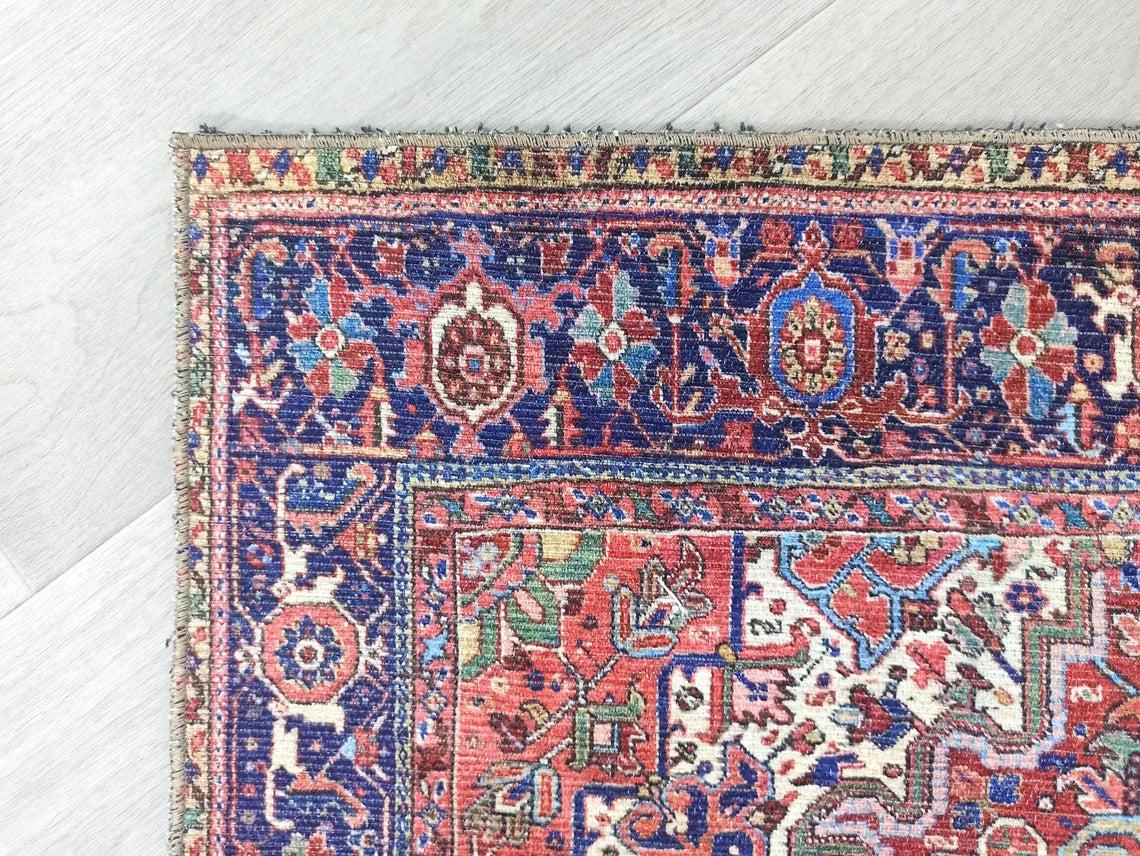 Vintage-Teppich in Rot-, Ziegel- und Burgundertönen