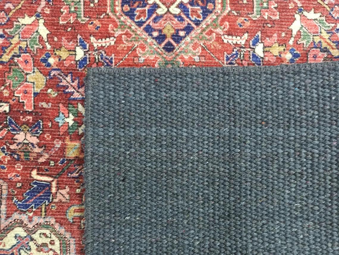 Vintage-Teppich in Rot-, Ziegel- und Burgundertönen