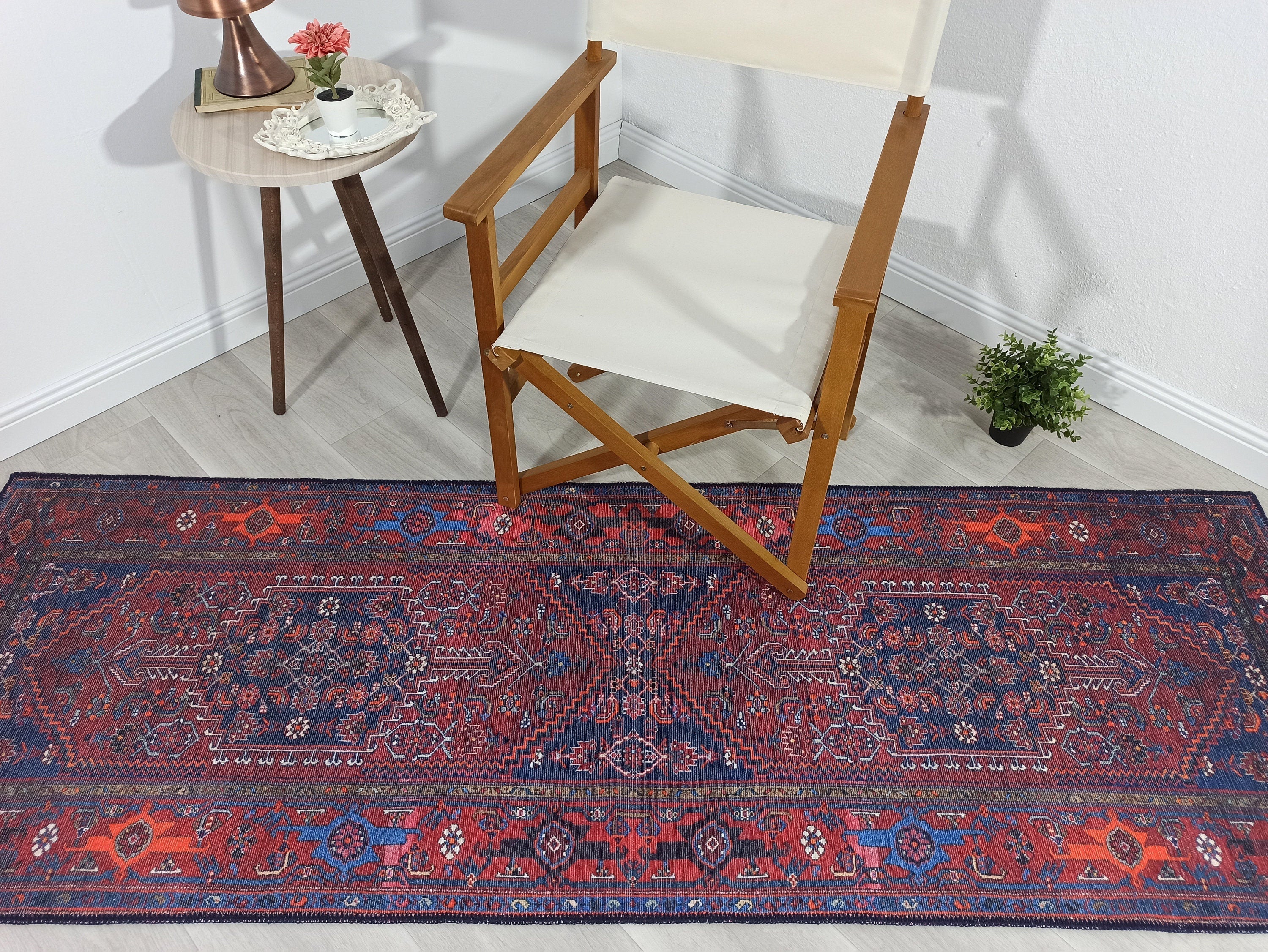 Vintage-Teppich mit braunen, orangen und marineblauen Motiven