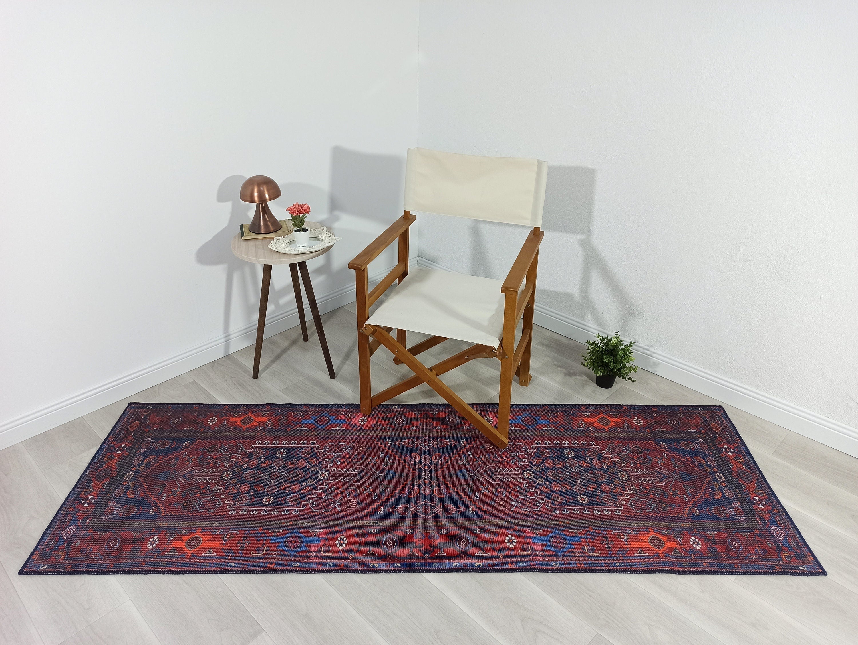 Vintage-Teppich mit braunen, orangen und marineblauen Motiven