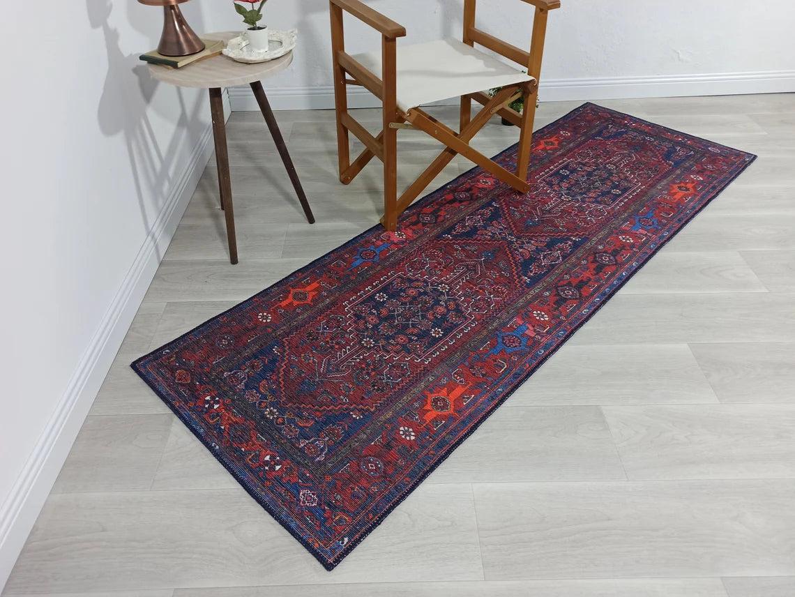 Vintage-Teppich mit braunen, orangen und marineblauen Motiven