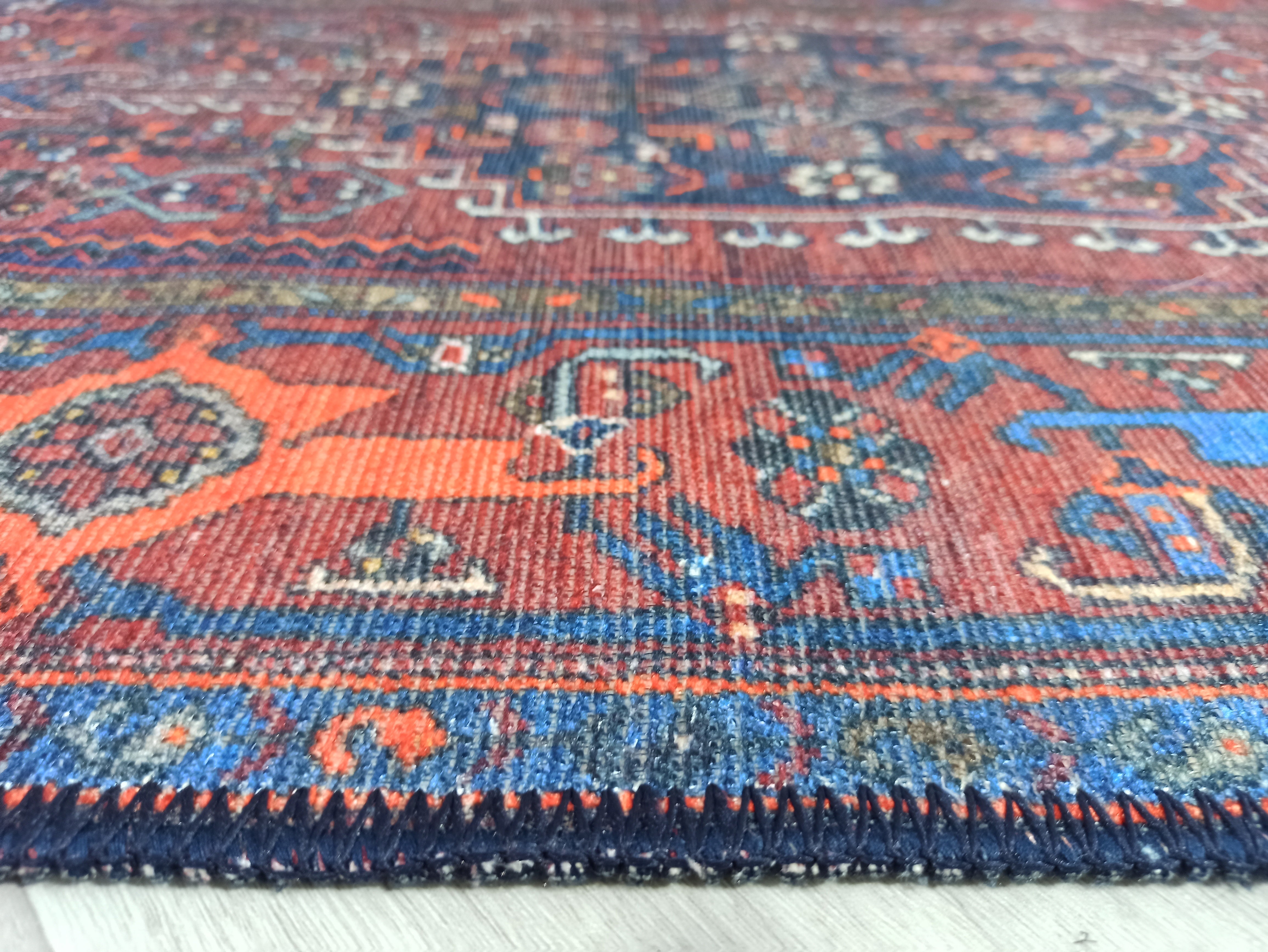 Vintage-Teppich mit braunen, orangen und marineblauen Motiven