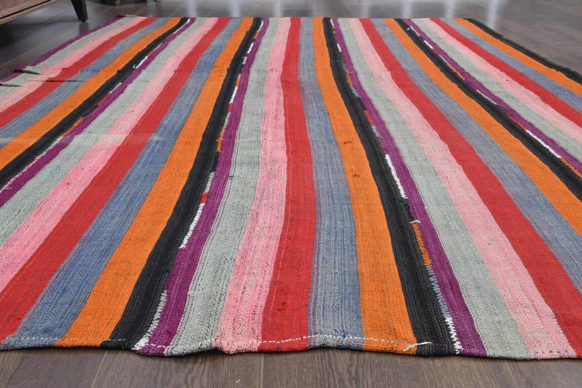 Çizgili el dokuma vintage kilim – pembe, turuncu ve kırmızı tonlarda yün dokuma
