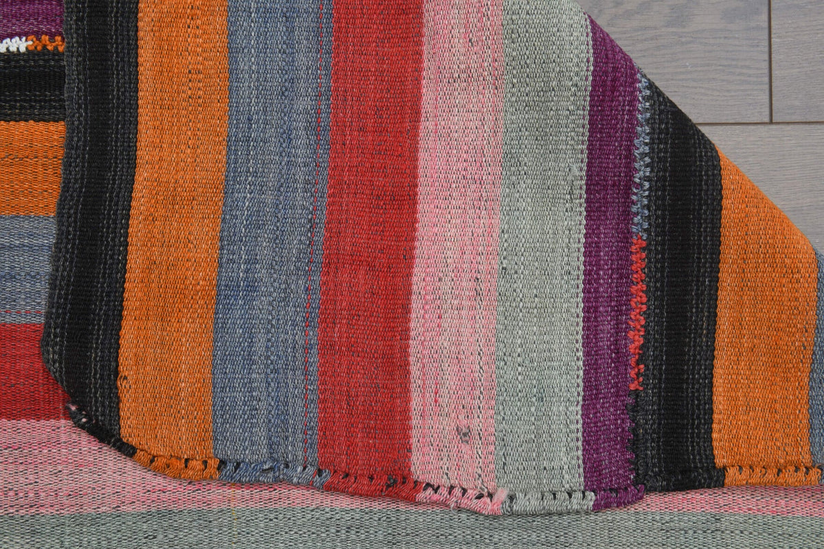 Pembe, turuncu ve kırmızı renkli el dokuma vintage kilim, %100 yün dokuma
