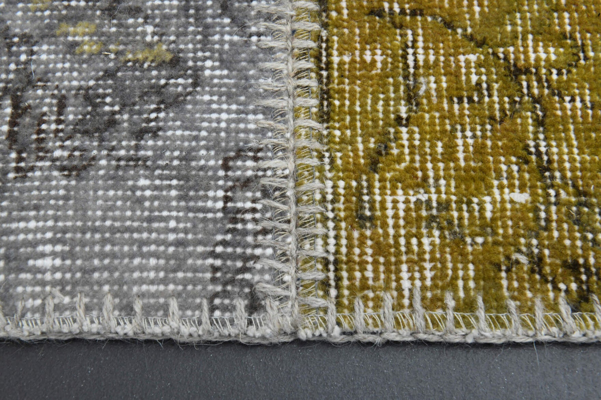 Oryantal desenli patchwork vintage halı – beyaz, gri ve turuncu tonlarda yün dokuma