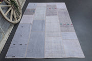 1970'lerden Anadolu kökenli düz zeminli patchwork vintage halı, 194x302 cm