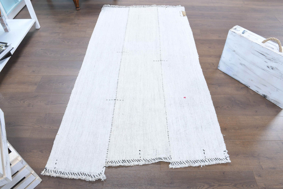 El yapımı vintage yolluk 102x211 cm düz desenli yün - yakın çekim doku detayı