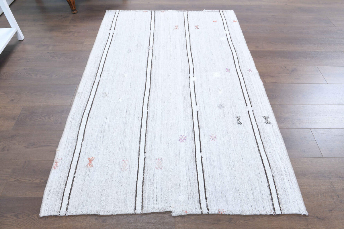 El yapımı vintage halı 119x185 cm i̇kat desenli yün - yakın çekim doku detayı