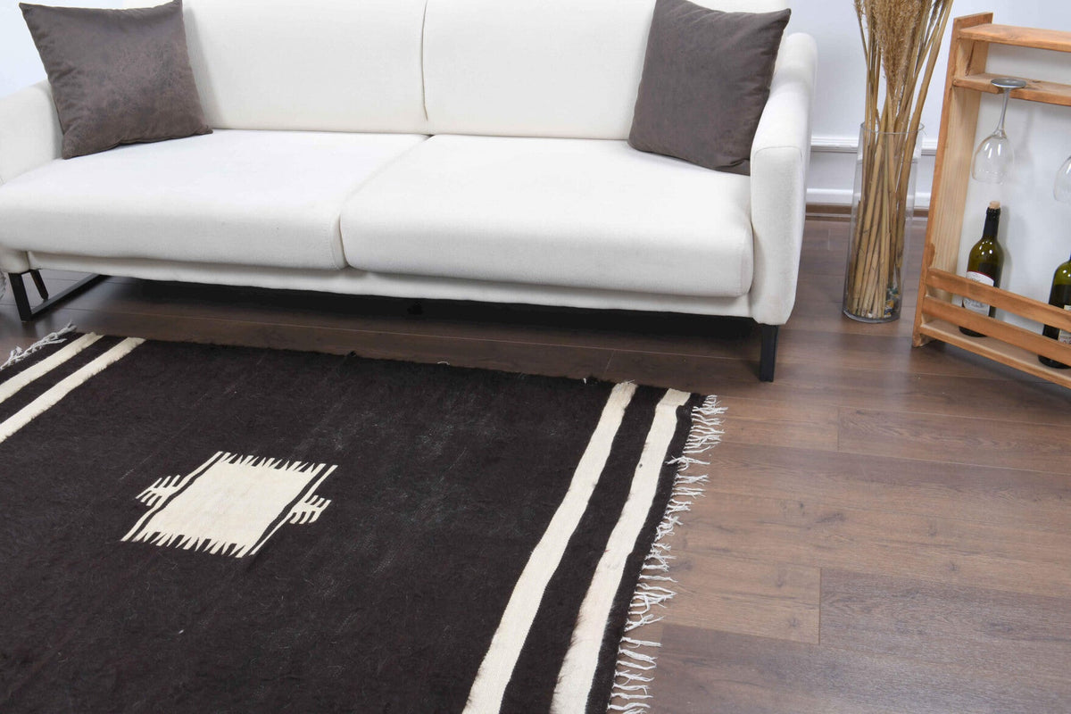El yapımı vintage halı 122x170 cm i̇kat desenli yün - yakın çekim doku detayı