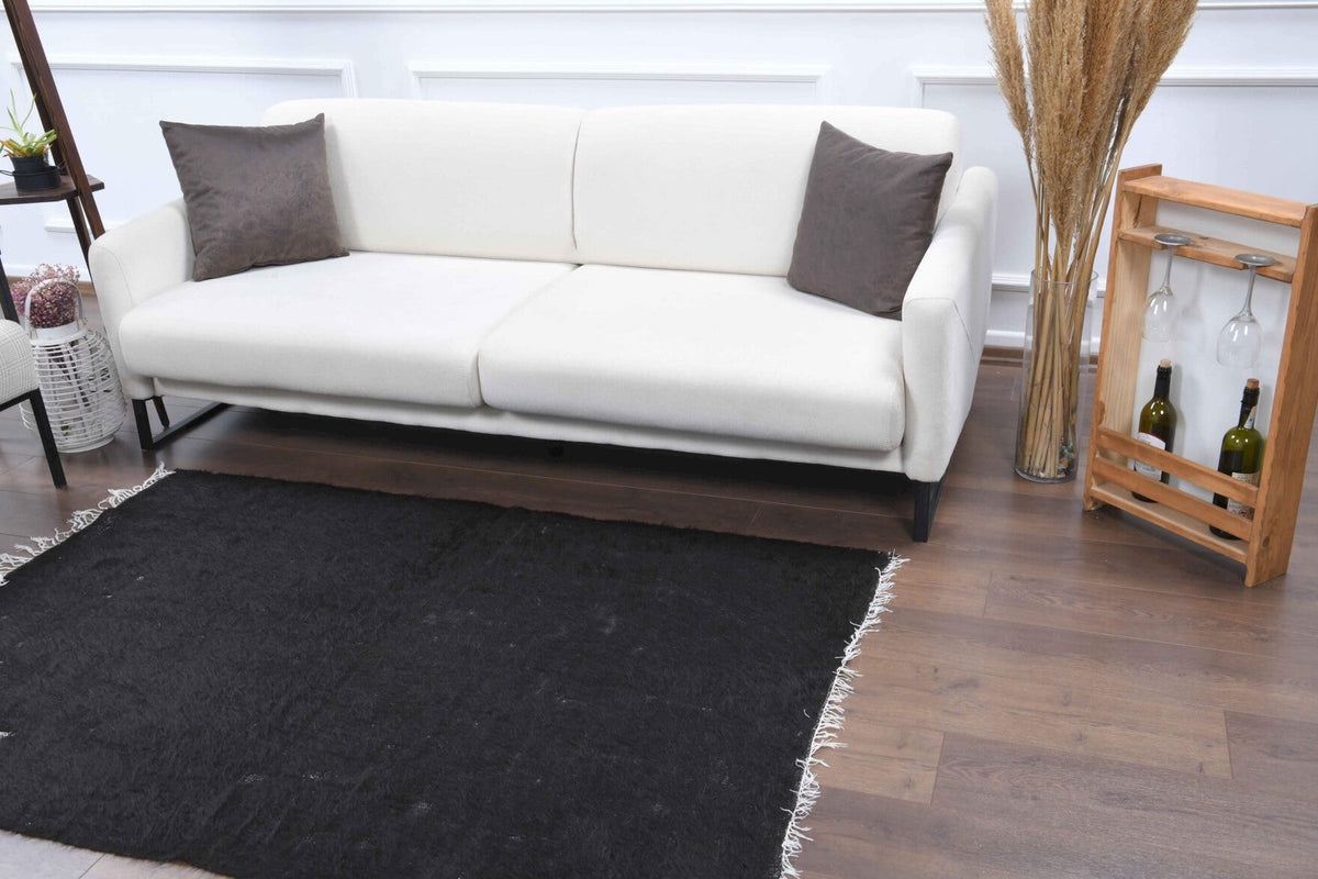 El yapımı vintage halı 119x178 cm düz desenli yün - yakın çekim doku detayı