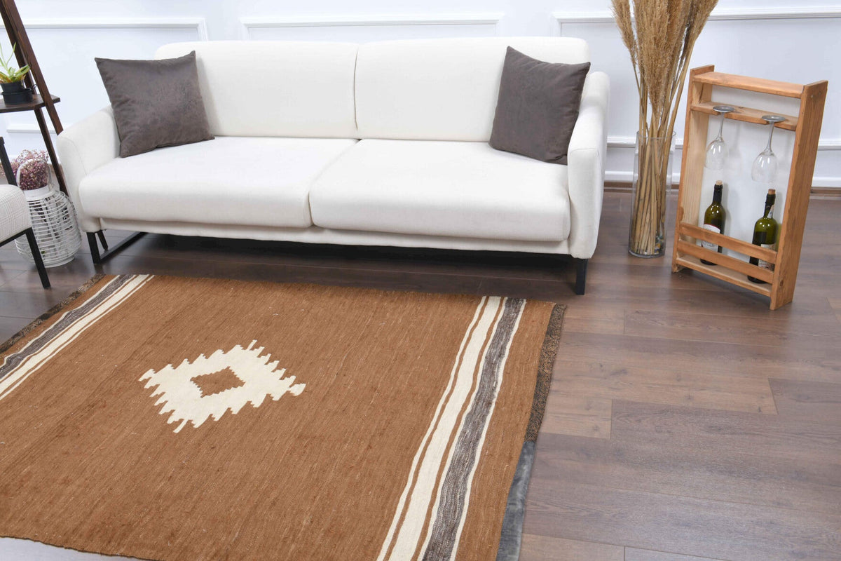 El yapımı vintage halı 140x185 cm madalyonlu desenli yün - yakın çekim doku detayı