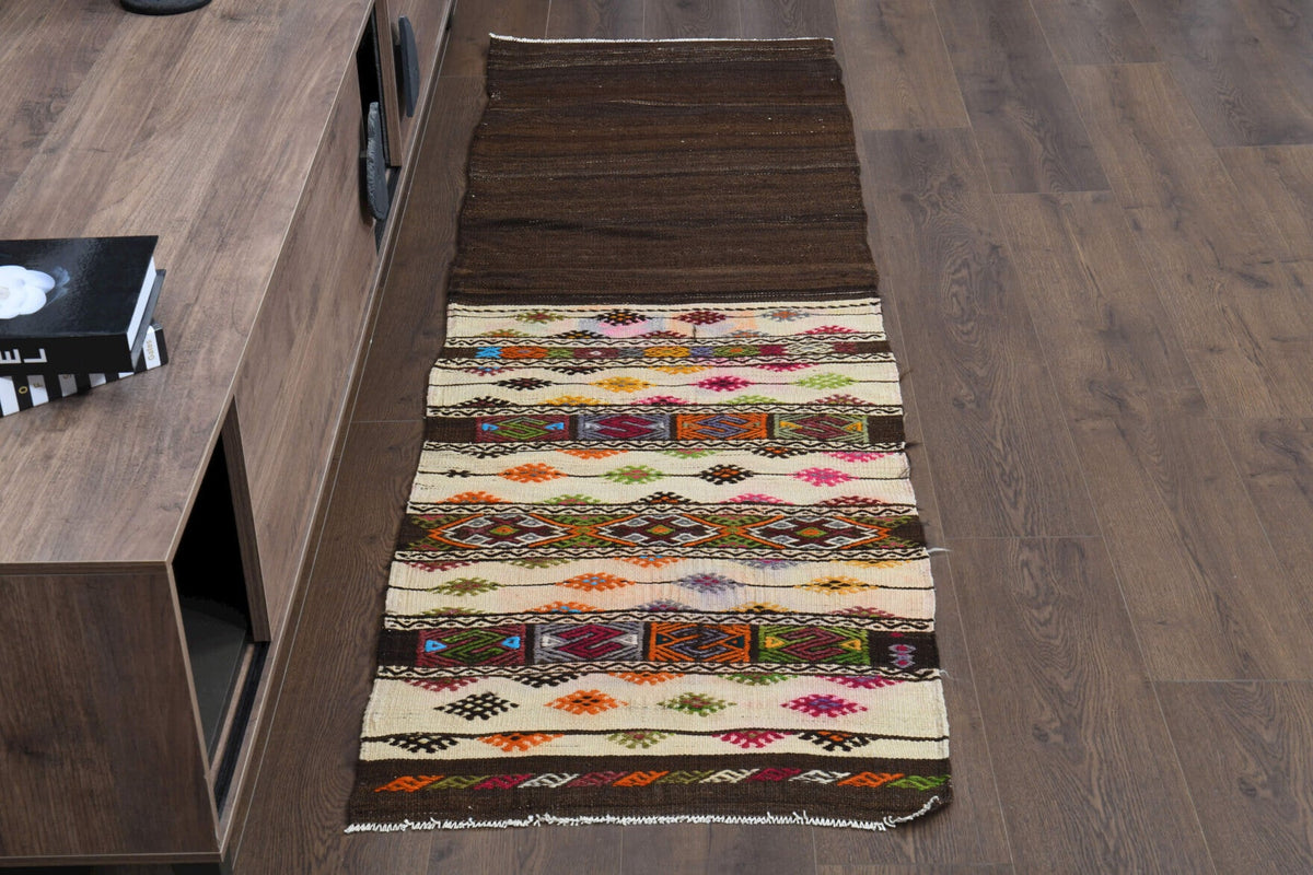 Oryantal desenli vintage kilim yolluk – kahverengi ve turuncu tonlarda yün dokuma