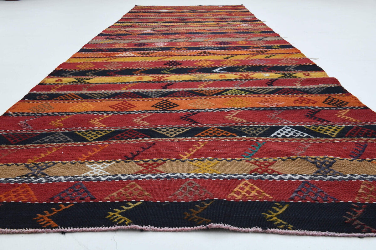 Çizgili vintage kilim yolluk – kırmızı ve turuncu tonlarda yün dokuma