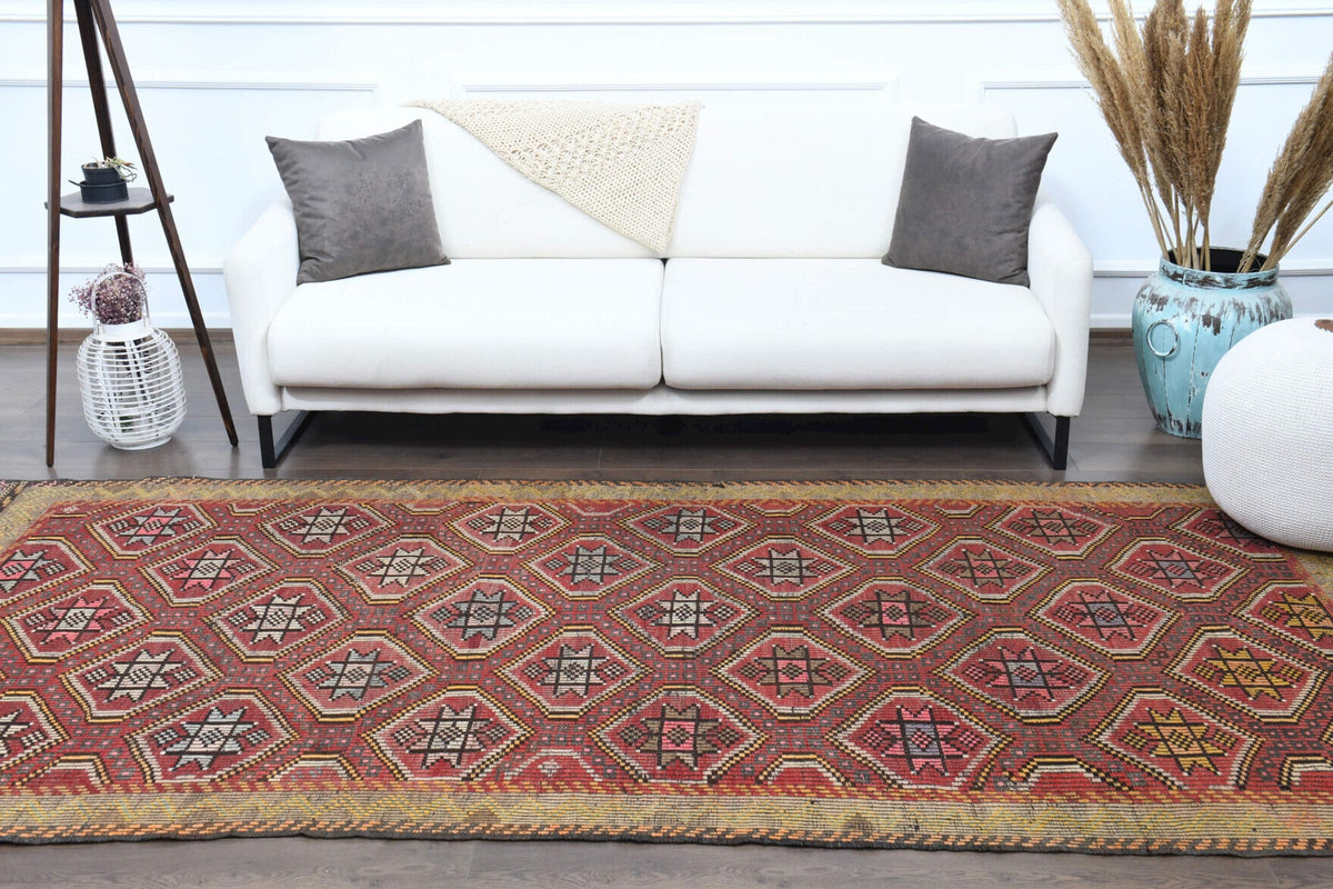 Vintage kilim 148x320 cm – turuncu, kırmızı ve pembe ikat desenli, el dokuma