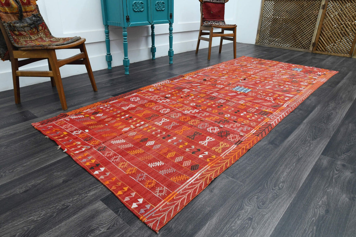 Ikat desenli vintage kilim yolluk – kırmızı ve turuncu tonlarda yün dokuma