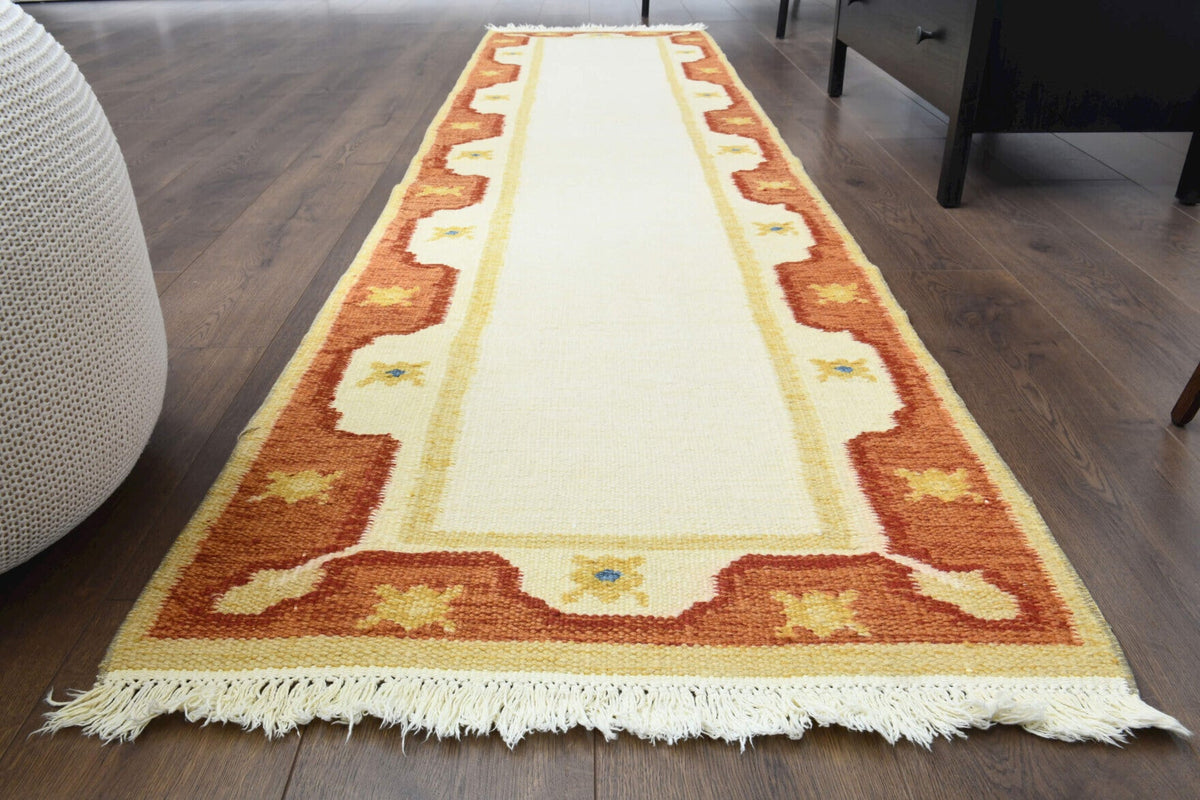 El yapımı vintage yolluk 74x290 cm tribal bordürlü desenli yün - yakın çekim doku detayı