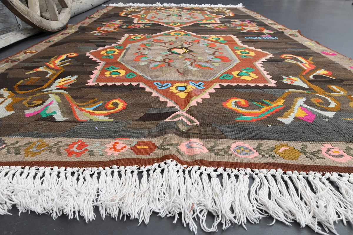 Oryantal desenli el dokuma vintage kilim – kahverengi, turuncu ve kırmızı tonlarda yün dokuma
