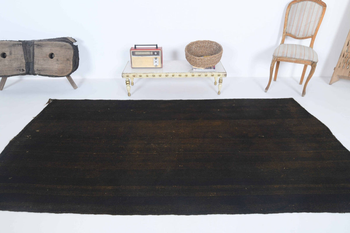 El yapımı vintage halı 142x259 cm düz desenli yün - yakın çekim doku detayı