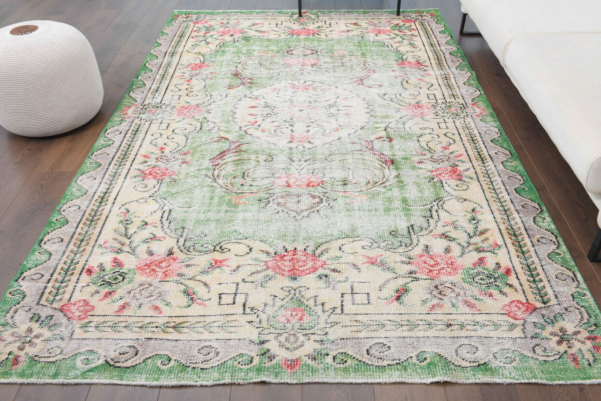 1970'lerden Anadolu kökenli çiçek desenli el dokuma vintage halı, 185x290 cm
