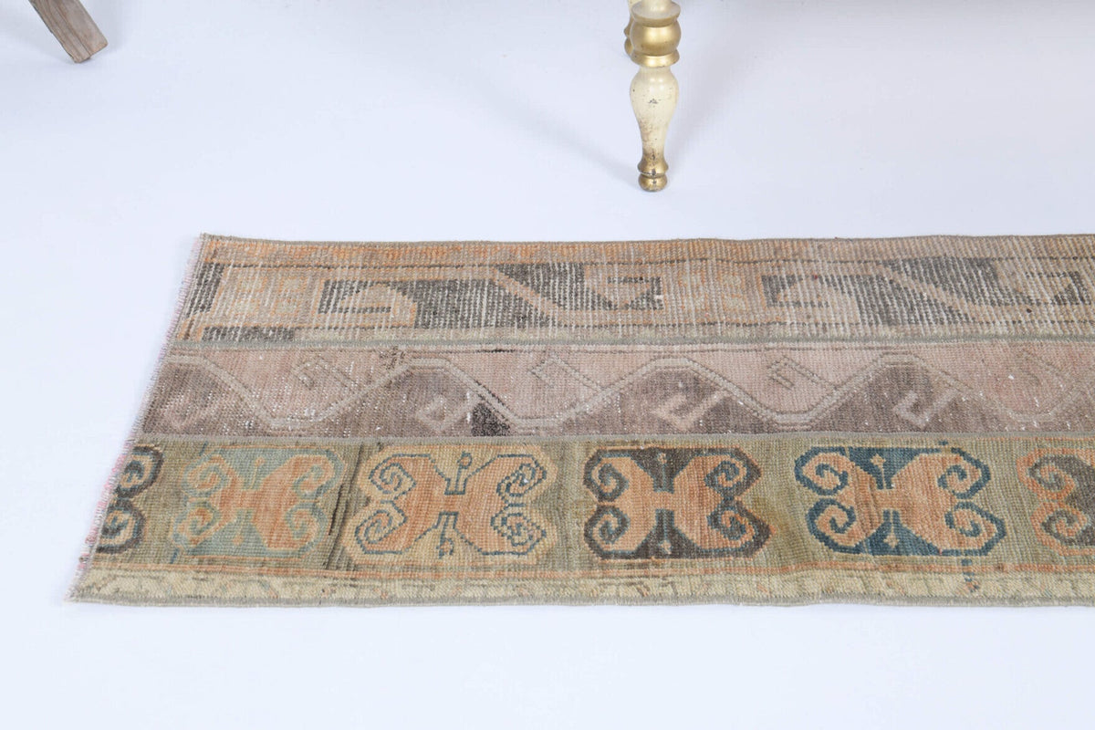Oryantal desenli patchwork vintage yolluk – turuncu ve beyaz tonlarda yün dokuma