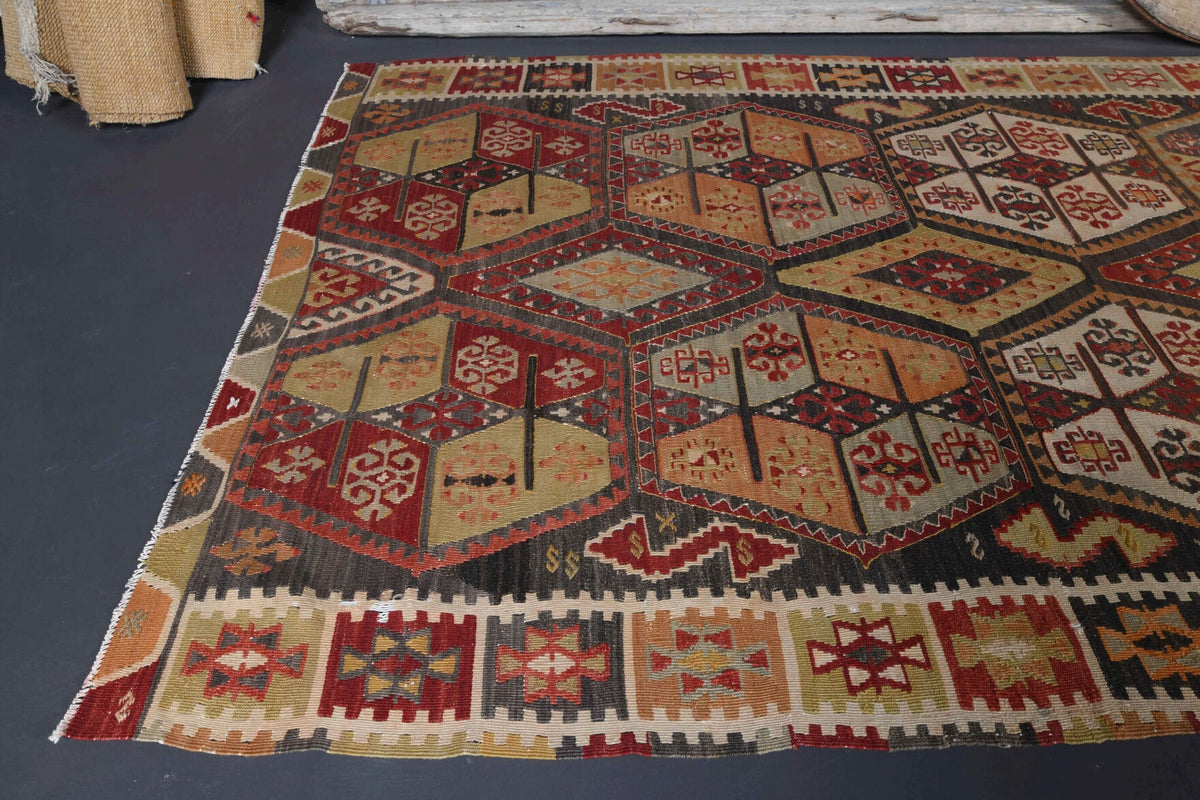Kilim motifli vintage kilim yolluk – kahverengi ve turuncu tonlarda yün dokuma