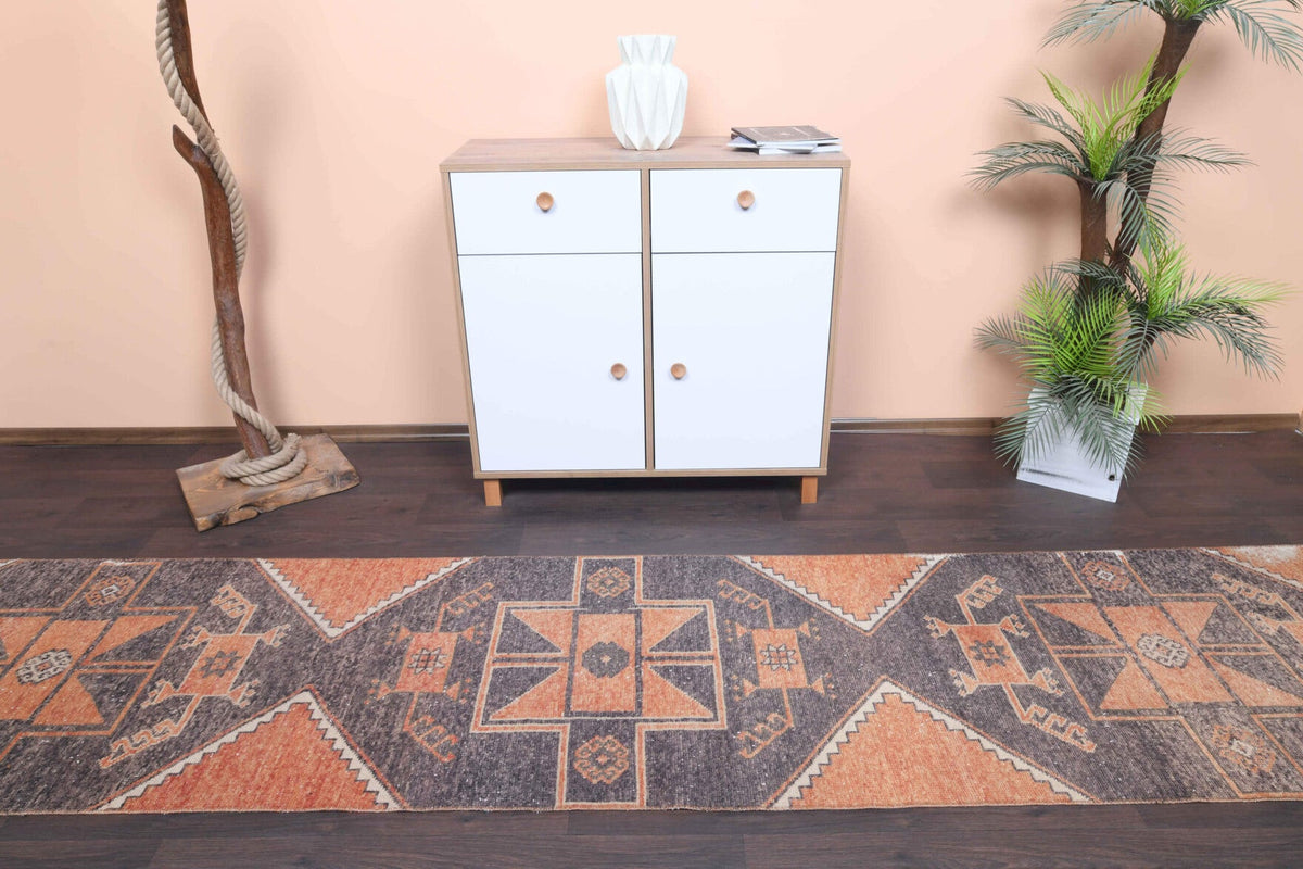 Geometrik desenli el dokuma vintage yolluk – turuncu ve kahverengi tonlarda yün dokuma