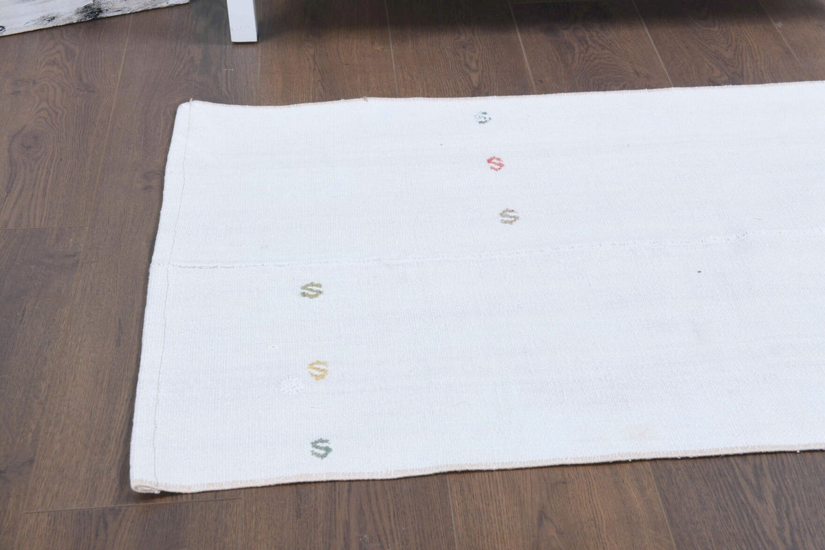 El yapımı vintage halı 64x117 cm düz desenli yün - detay görünümü