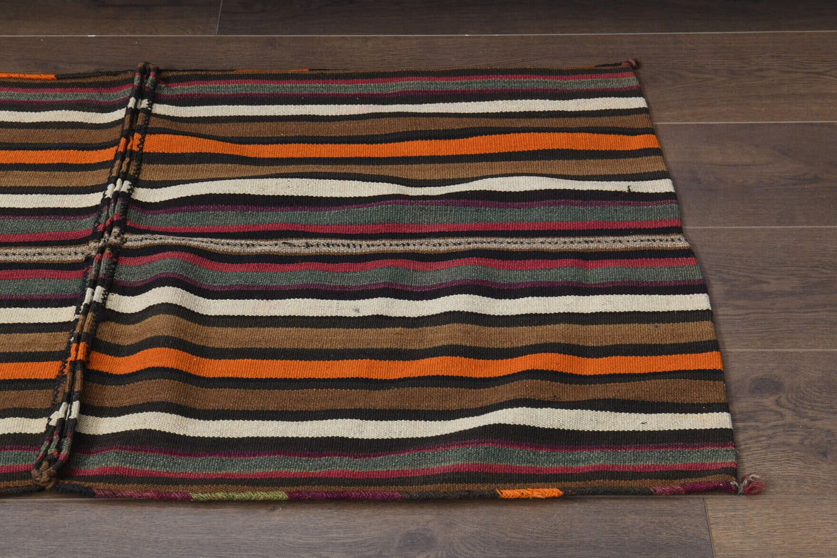 Vintage kilim 69x127 cm – kahverengi, turuncu ve kırmızı oryantal desenli, el dokuma