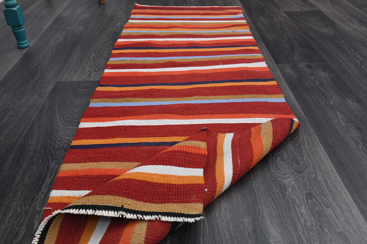 Pera Halı tek parça koleksiyonu: oryantal desenli vintage kilim yolluk, kırmızı ve turuncu